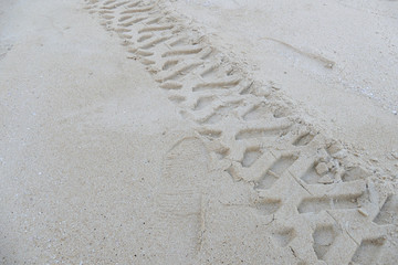 rutty wheelprint on the sand