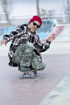 old man skater enjoying skating