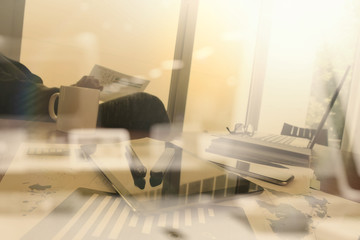 Fototapeta premium business documents on office table with smart phone and digital