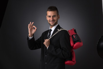 Businessman in boxing gloves