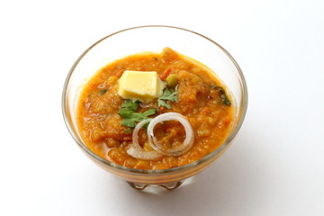 pav bhaji an indian cuisine or dish prepared with crushing mixed vegetables mainly potatoes,tomato,peas and some other green vegetables made spicy and served with butter