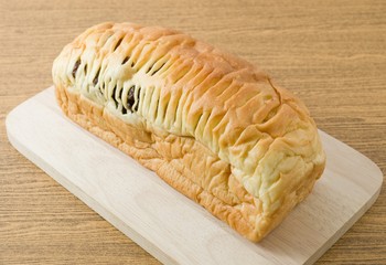 Raisin Bread on A Wooden Cutting Board