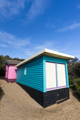 Fototapeta na wymiar Blue and pink bathing boxes