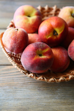 fresh peaches in basket