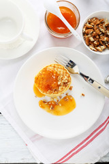 Delicious pancakes with apricot jam