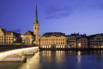 Fototapeta na wymiar Limmat riverside with famous church, Zurich