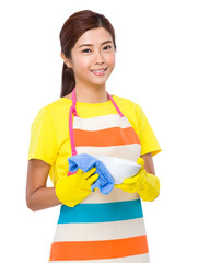 Asian housewife washing dishes
