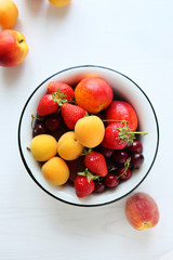 Naklejka na ściany i meble fruits in bowl, top view