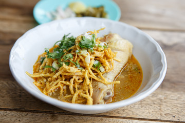 curried chicken noodles soup famous food in North of Thailand