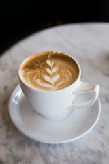 hot cappuccino with latte art