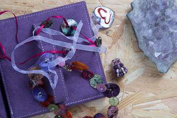 Colorful jewellery  under wooden background