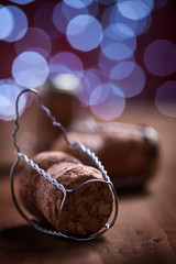 champagne corcks on wood board