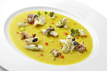 Fish Dish Cream of Jerusalem artichokes with saffron and squid w