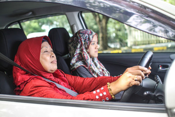 muslim women in a car