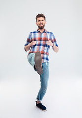 Naklejka premium Full length portrait of angry man kicking
