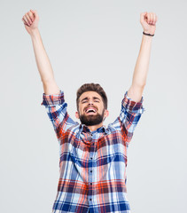 Cheerful man celebrating his success