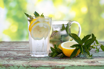 fresh lemonade juice on wooden plate 