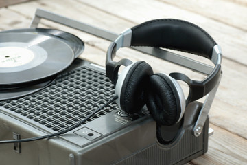 Obraz na płótnie Canvas player with headphones on vinyl plates