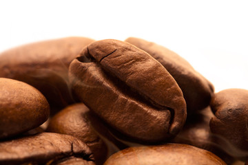 Coffee beans background. Roasted coffee. Brown background. Ground coffee and whole bean coffee. 