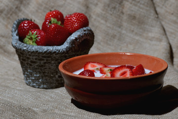 Strawberry close-up bowl with milk