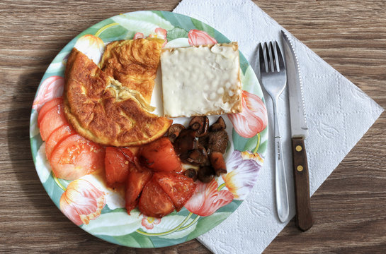 Omelet breakfast snack with cheese and tomatoes