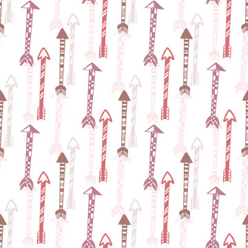 Seamless background of vintage arrow. Hand drawn ethnic arrows texture for textile, print, web. Vector