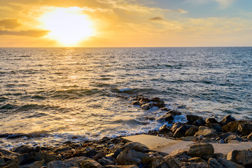 Sunset above the sea at Marino Rocks beach