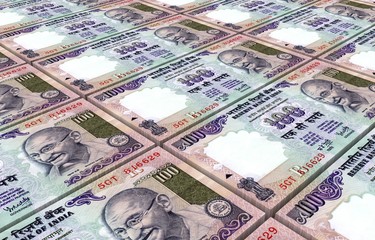India Rupee bills stacks background.