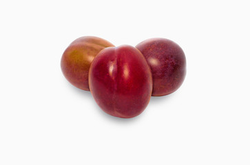Fototapeta na wymiar Three plums