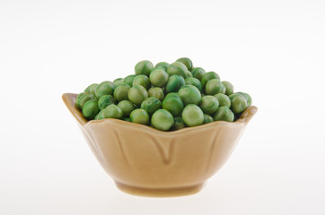 nuts or crispy coated green pea on the background.