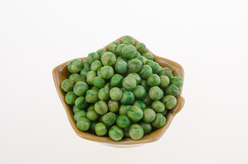 nuts or crispy coated green pea on the background.