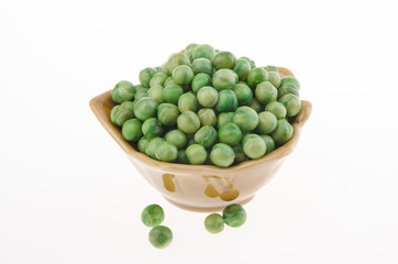 nuts or crispy coated green pea on the background.