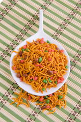 murukku or traditional indian snack on background.