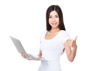 Asian woman hold with notebook computer