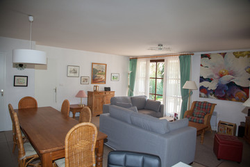 Modern, bright, clean, living room   in a  house