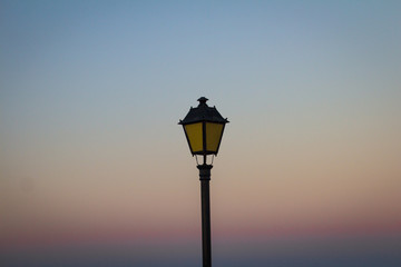 Fototapeta na wymiar Lamp post at sunset