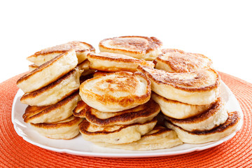 Homemade flapjacks on a plate, Isolated white background