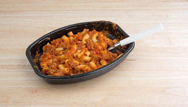 Beef and Macaroni TV dinner with spoon