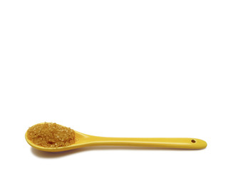 Ceramic spoon with brown sugar