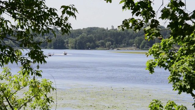 Speed motorboat riding on lake Zalew Zegrzynski in Poland