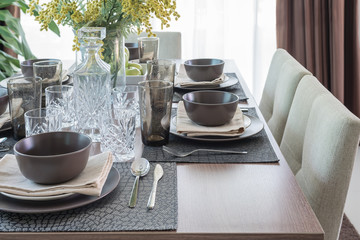 wooden dining table with table set
