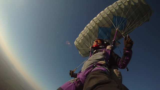 Skydiving parachute flying sunset