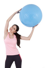 Fototapeta premium girl doing exercises with fitness ball
