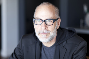 Serious Senior Man Looking At The Camera