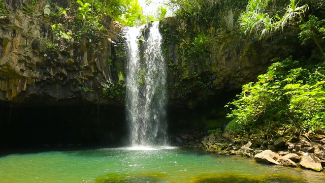 Amazing Tropical Waterfall in Hawaii. Slow Pan Down.
