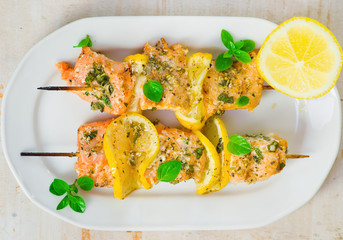kebab from a salmon with a lemon.