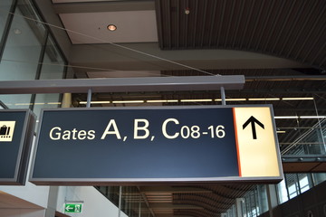 Airport gates sign showing direction to gates