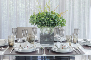 plants in glass vase on dinning table