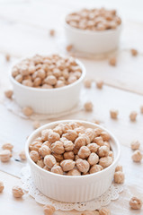 chick-pea on white wooden background