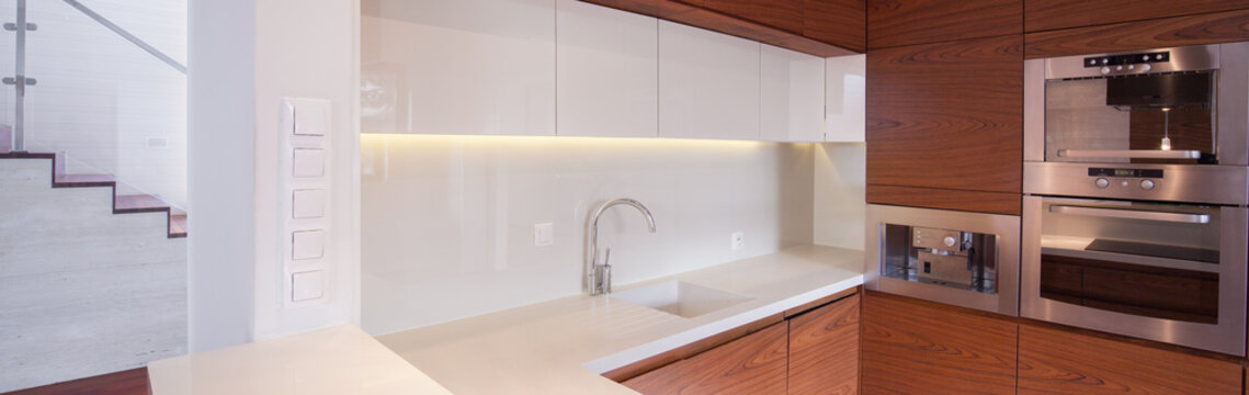 Modern white and brown kitchen